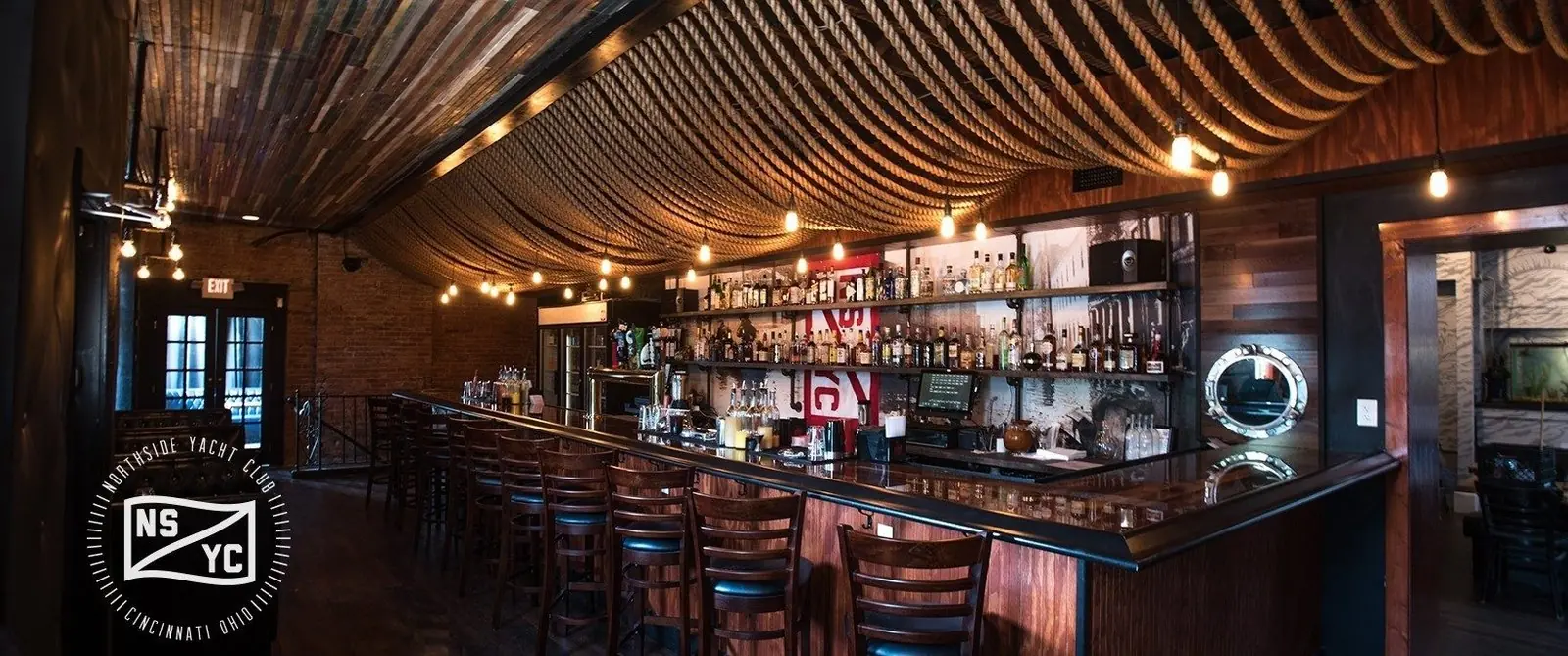 The bar at Northside Yacht Club under the rope ceiling